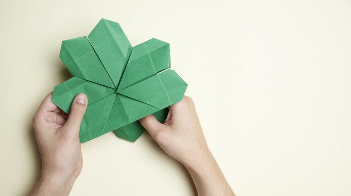 an origami shamrock that can be used as a bookmark