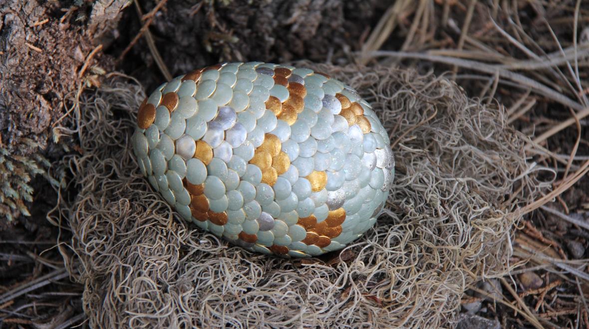 Easter eggs decorated with thumb tacks
