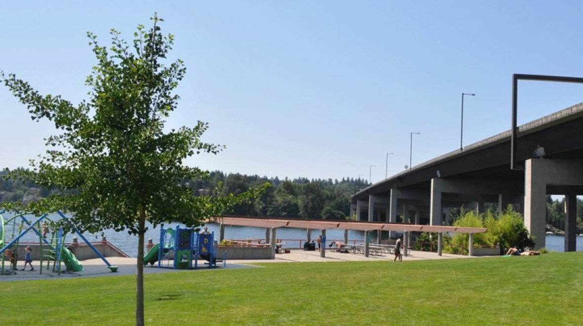 playground with water in the background at Enatai Beach Park, a Bellevue playground with a view