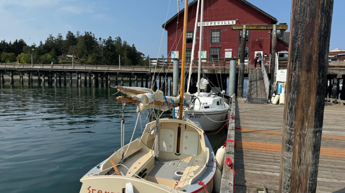 Kids walking along the dock in Coupeville on Whidbey Island