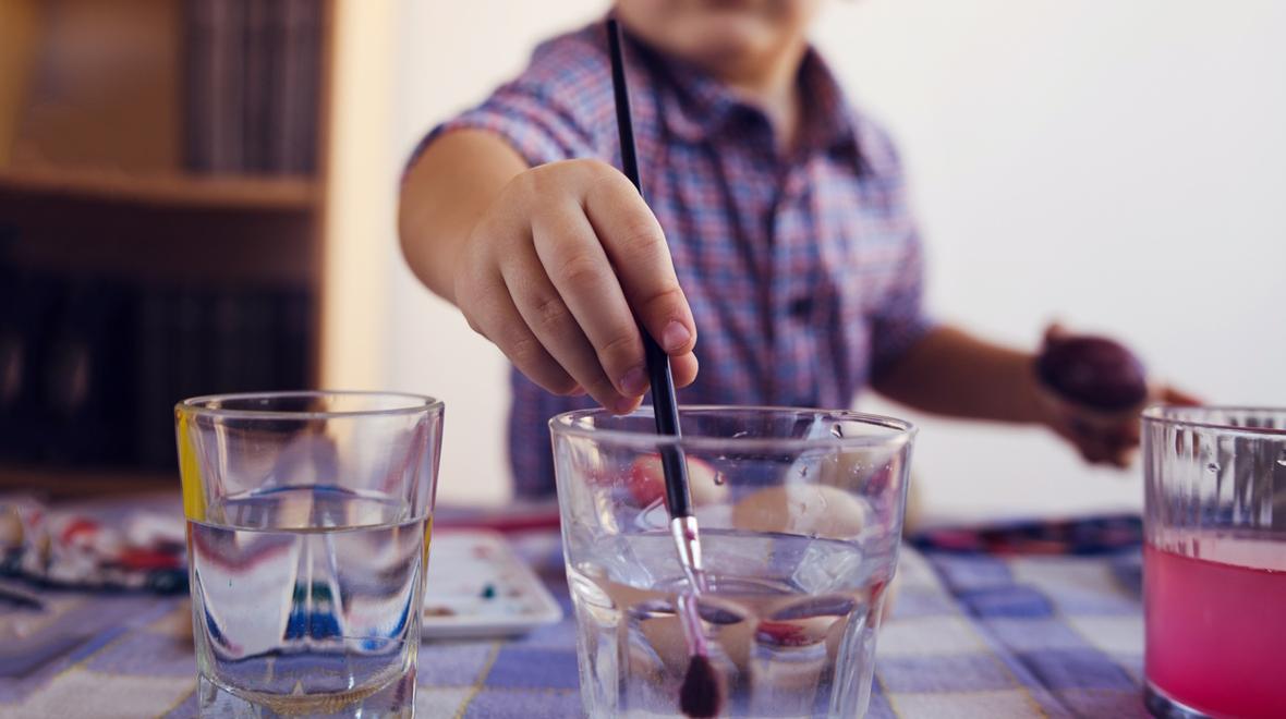 child painting with water