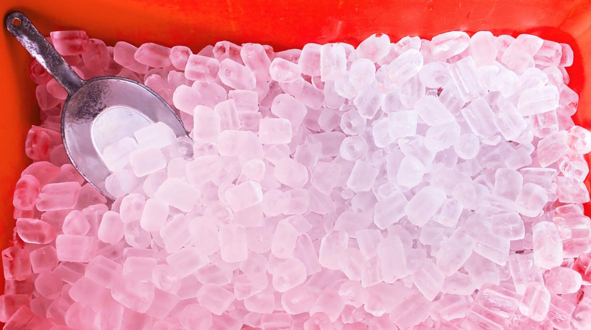 red bin with ice and a metal scoop 