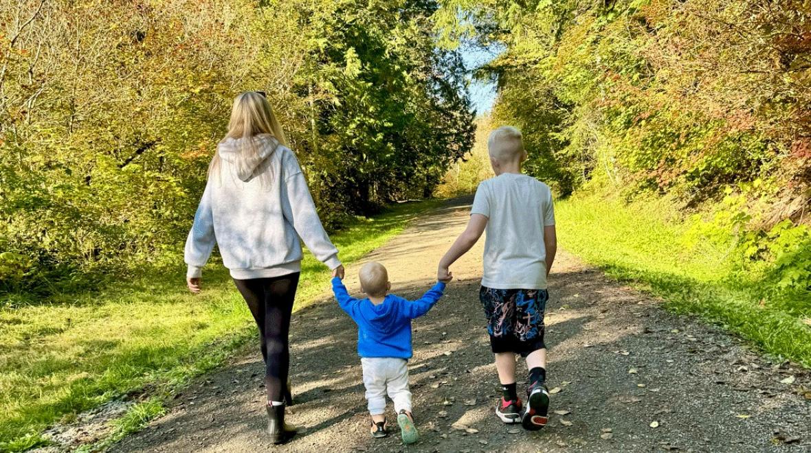 kids walking along the Cedar River Trail during a fall hike