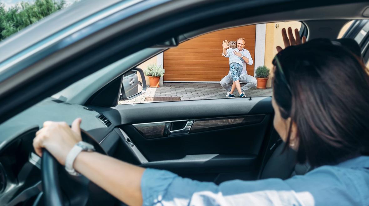 mom dropping off child with dad