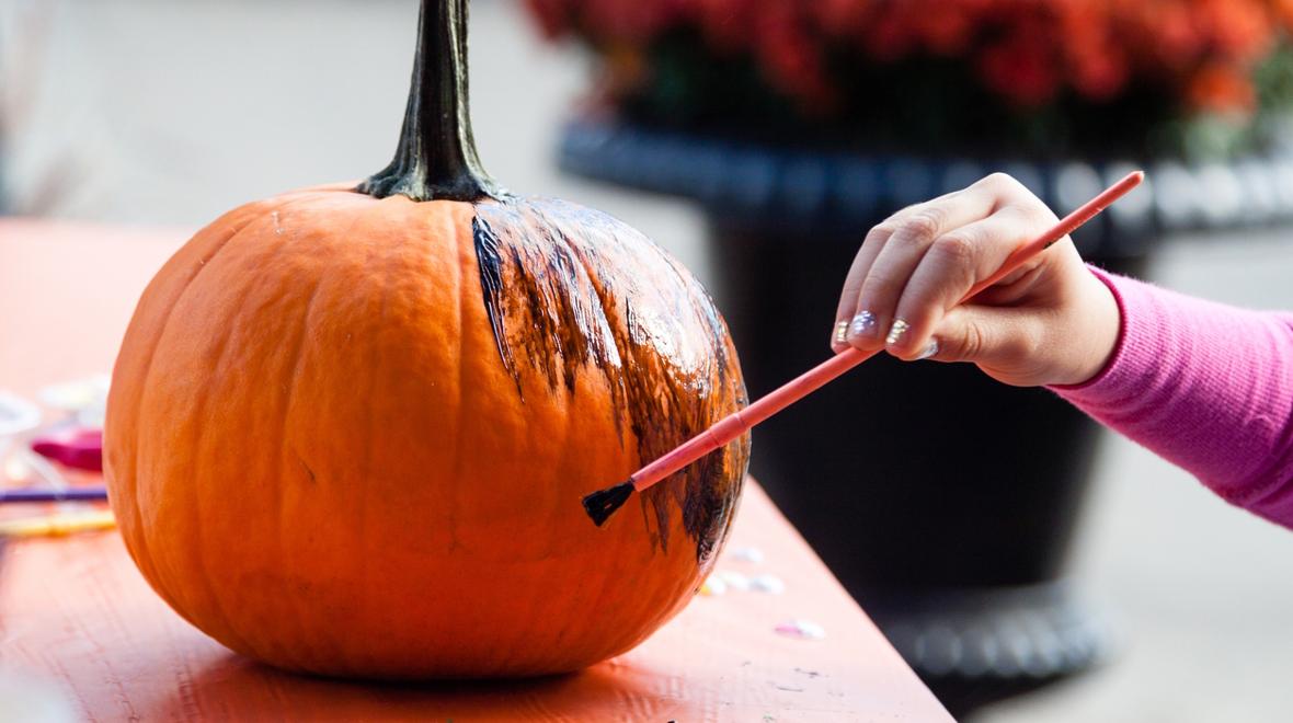 painting a pumpkin black