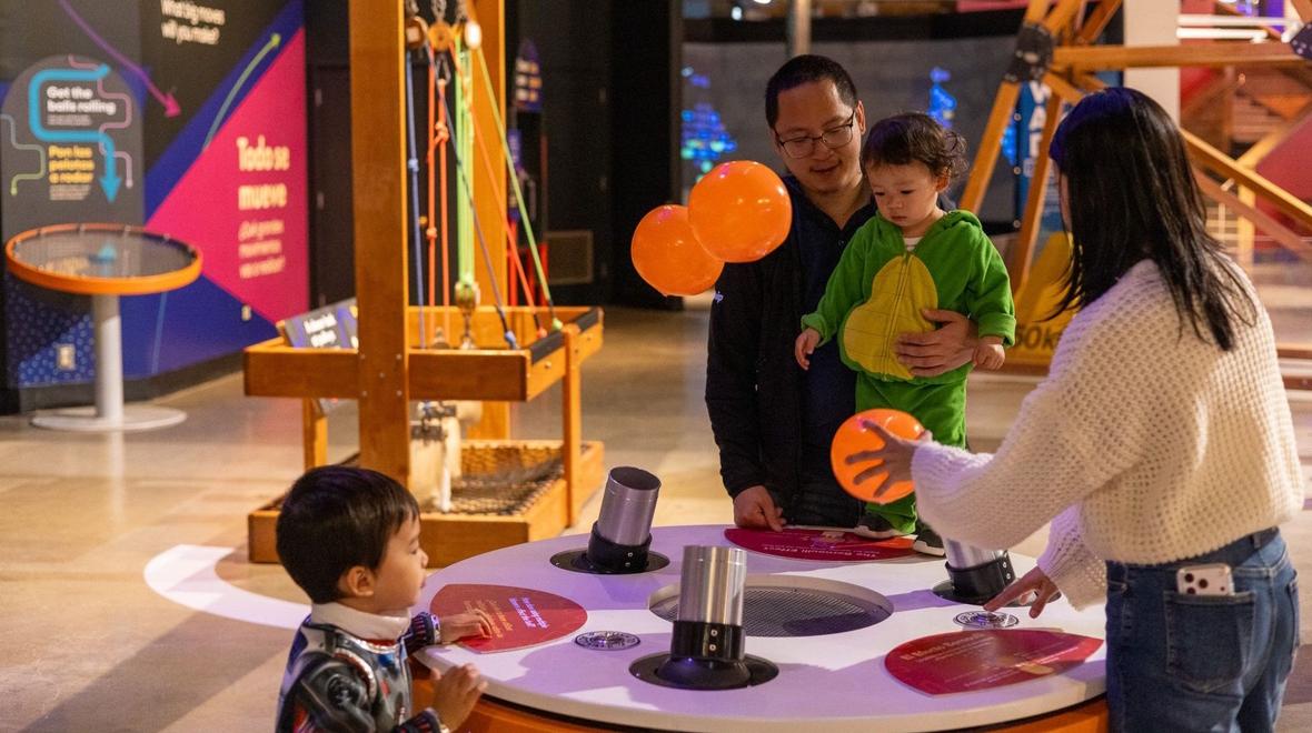 family having fun at Pacific Science Center