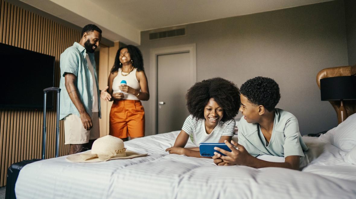 kids in a hotel room having fun