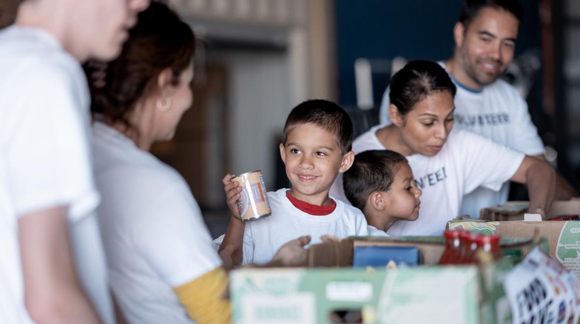 boy and his family at a food bank