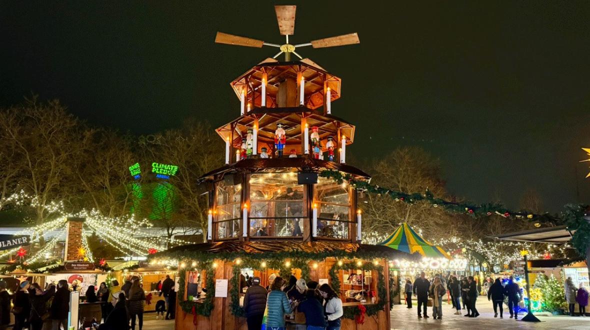 the Christmas pyramid at Seattle Christmas Market, illuminated at night