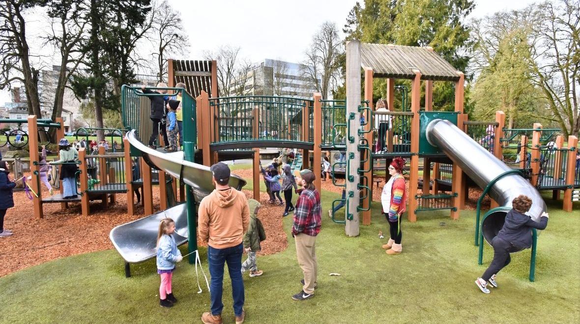 wright park playground reopening celebration with families playing
