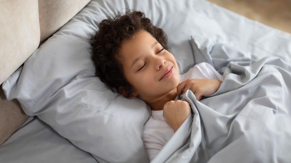 boy sleeping in bedroom