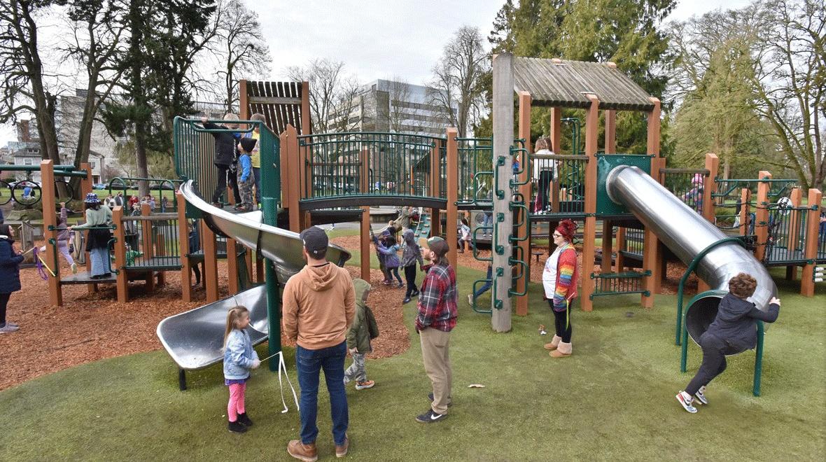families playing on the playground at Wright Park