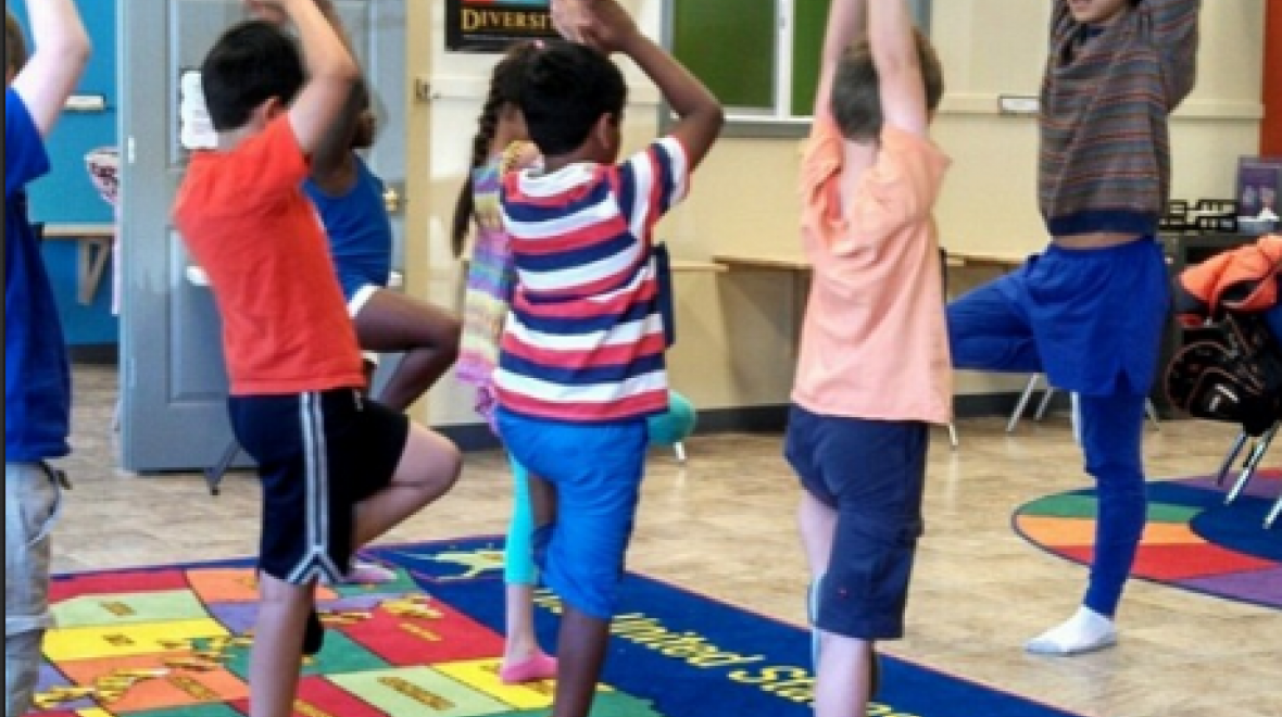 Mr. Chad teaching students at his After School center