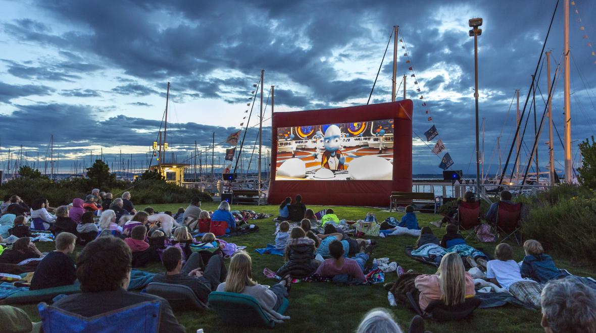 See a movie with the marina as a background