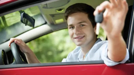 Teen boy in car