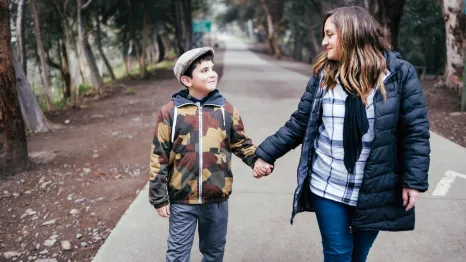 Mom and son walking and having a mental health check in