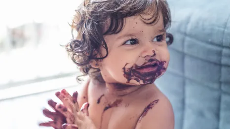 a child enjoys Brazil's superfruit, a healthy dessert recipe