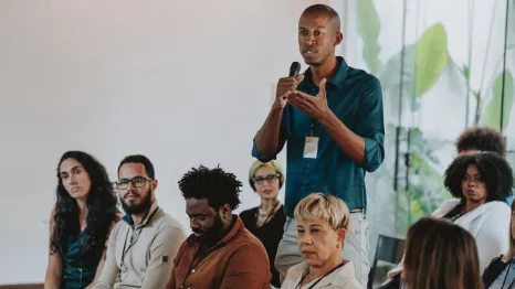 people asking questions and engaging in school board elections