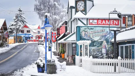winter scene in Downtown Poulsbo with snow-covered stores