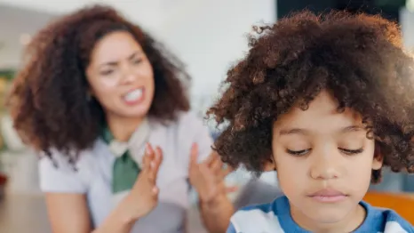 angry and mom scolding child for behavior problem
