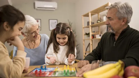 family playing game on game night together