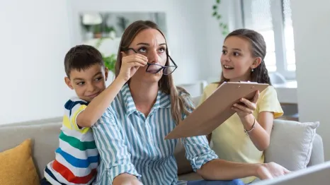 frustrated mum tired of difficult children trying to work from home