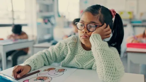 girl child tired and bored at school