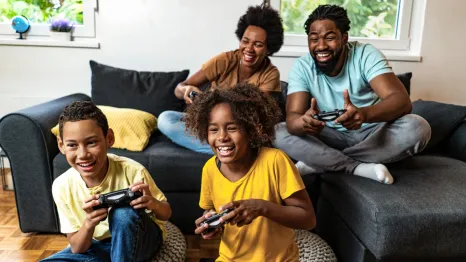 family playing video games together
