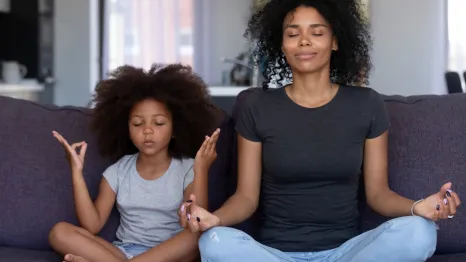 Mom and child using breathing exercises to hold off a tantrum