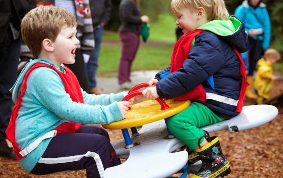 Kids playing in park at a co-op preschool near Seattle