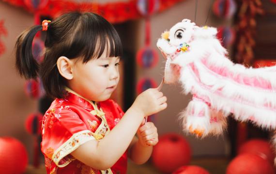 Little girl celebrating Lunar New Year