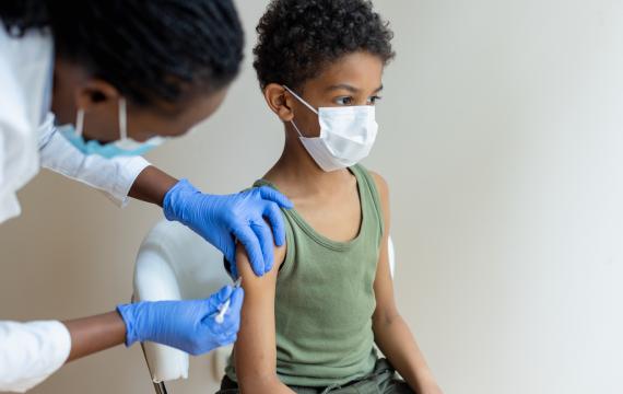 Young child getting a shot