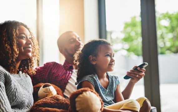 Family watching tv