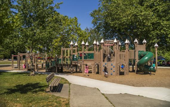 Kids play on the castle-like play structure at Roxhill Park in West Seattle, ParentMap's playground of the week, among weekend activities for Seattle families Feb. 10–12