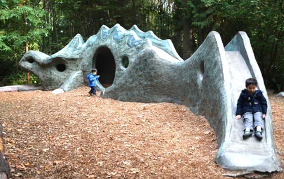A child slides down the dragon slide at Mercer Island's Deane's Children's park near Seattle best weekend activities kids families