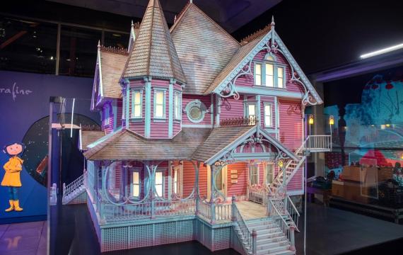The pink palace set piece from the movie Coraline by LAIKA Studios part of a special exhibit on the stop-motion animation studio at Seattle's Museum of Pop Culture, commonly called MoPOP