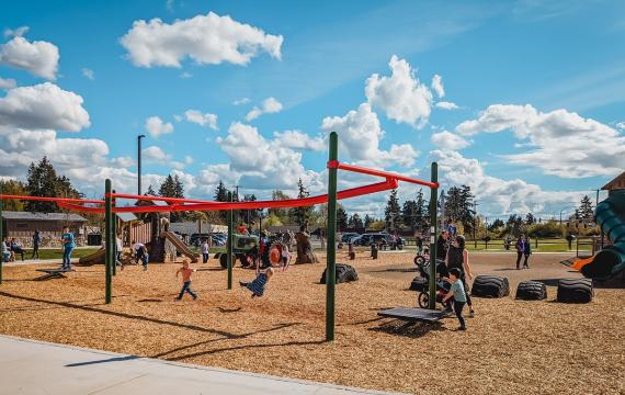 Kids play on the updated, farm-themed playground at Edgewood Community Park near Seattle, among best activities for kids and families this weekend