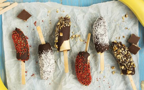 Frozen bananas covered in chocolate and sprinkles is a simple birthday party snack to make