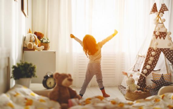 kid in their bedroom