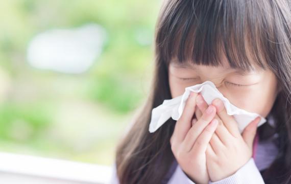 a little girl with spring time allergies