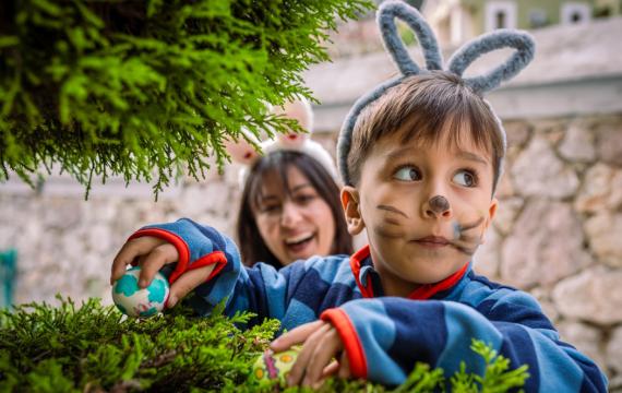 child playing a game on Easter and having fun