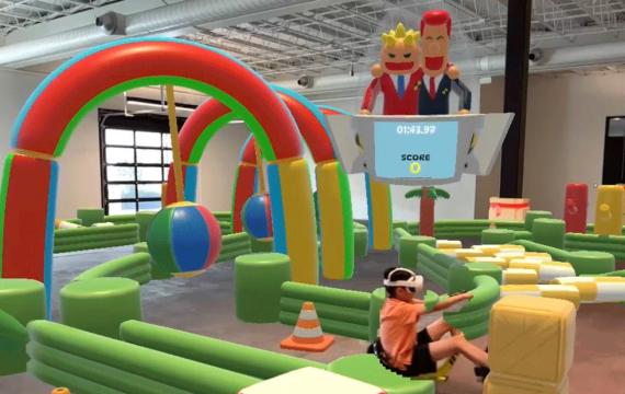 young boy wearing VR headseat at DreamPark Seattle playing an immersive video game