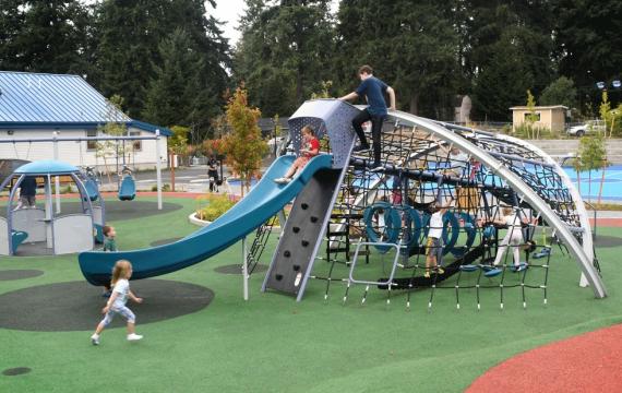 kids playing on the inclusive playground at Richmond Highlands Park in Shoreline