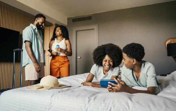 kids in a hotel room having fun
