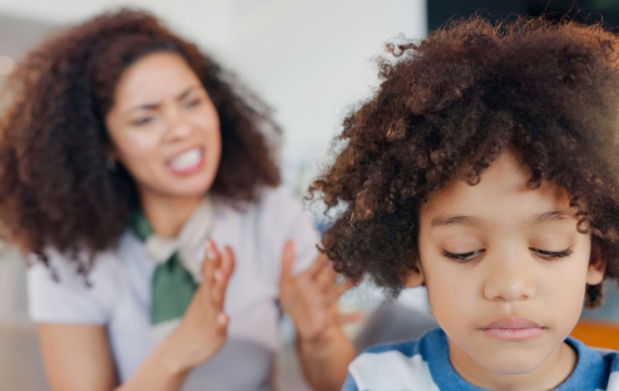 angry and mom scolding child for behavior problem
