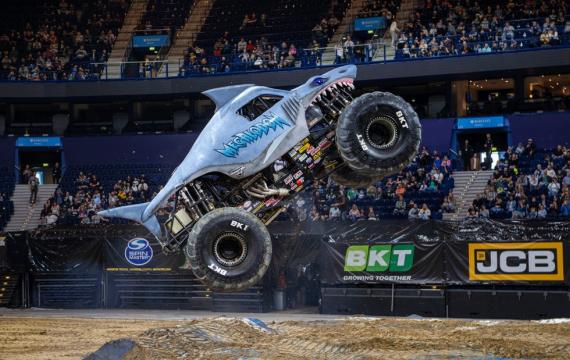 megalodon monster truck in the air during Monster Jam, a family-friendly activity near Seattle happening this weekend