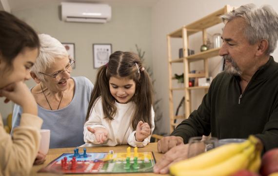 family playing game on game night together