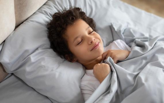 boy sleeping in bedroom