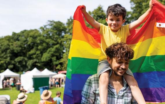 little boy at pride festival
