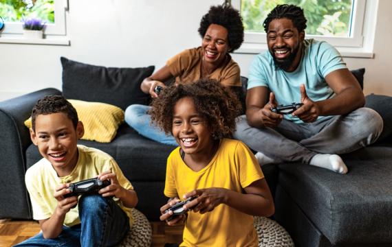 family playing video games together